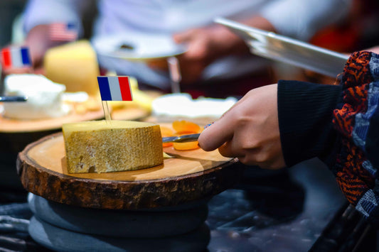 Hands cutting cheese - Tumu Learning