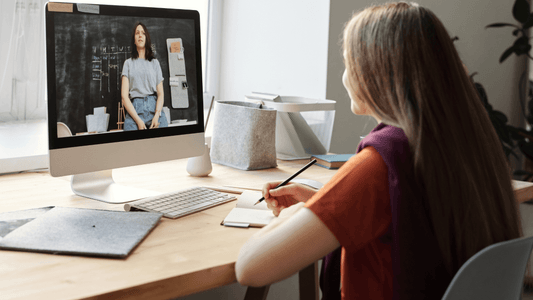 Student attending an online TEF Canada exam preparation coaching session via computer.
