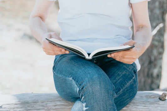 person reading with the book open on their lap Say thanks by giving Avelino Calvar Martinez credit   Photo by Avelino Calvar Martinez from Burst  Person Reading With The Book Open