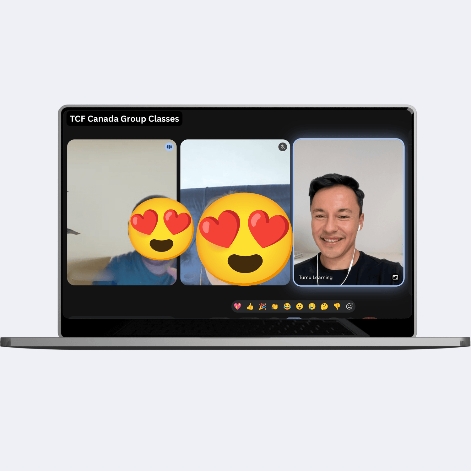 A laptop on a light gray background displaying a virtual classroom screen labeled 'TCF Canada Group Classes' with three video call windows and heart-eyes emoji faces.